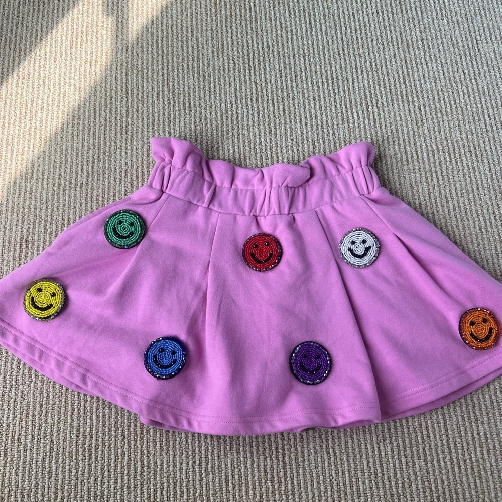 Brand new Queen of Sparkles smiley face skort